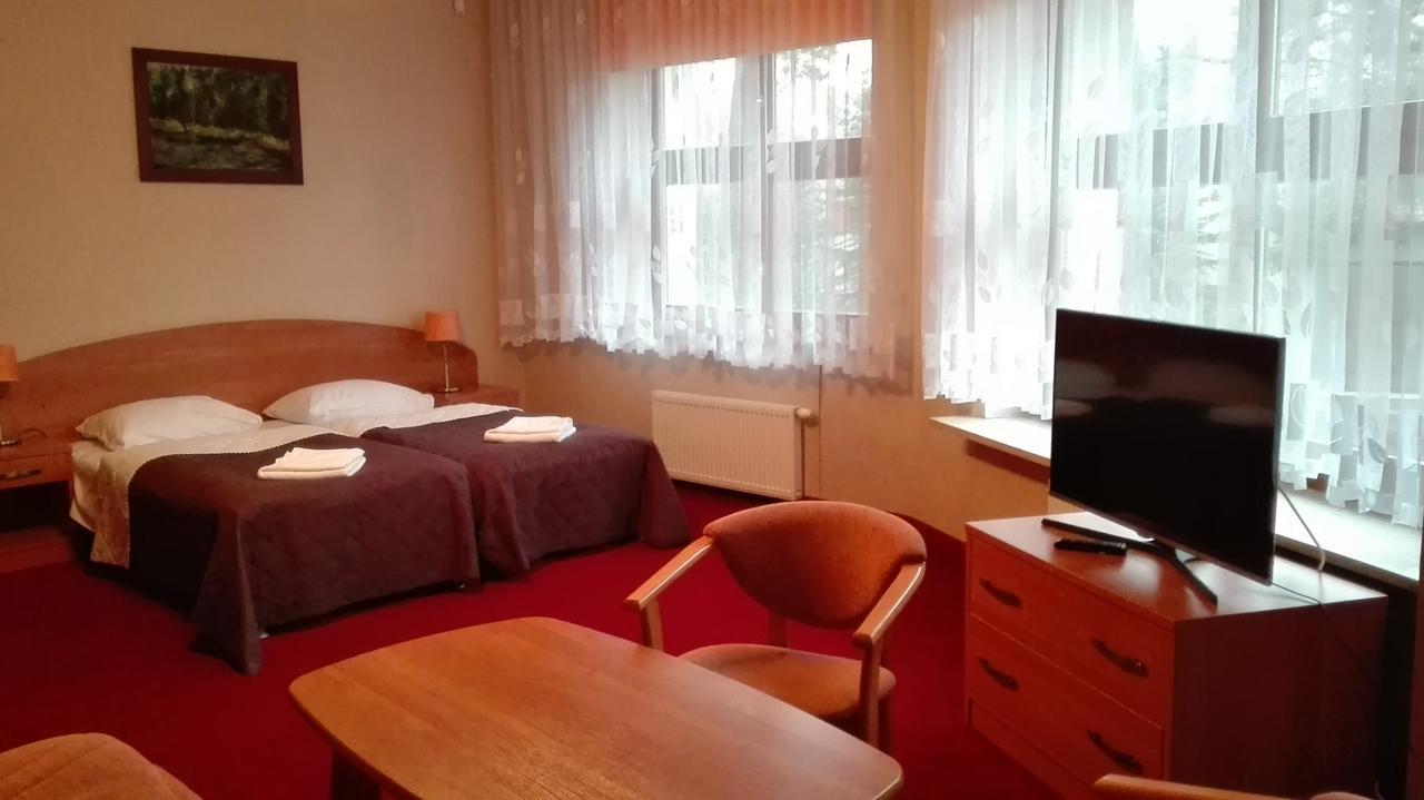 Osrodek Szkoleniowo - Wypoczynkowy Guzianka Hotell Ruciane-Nida Exteriör bild